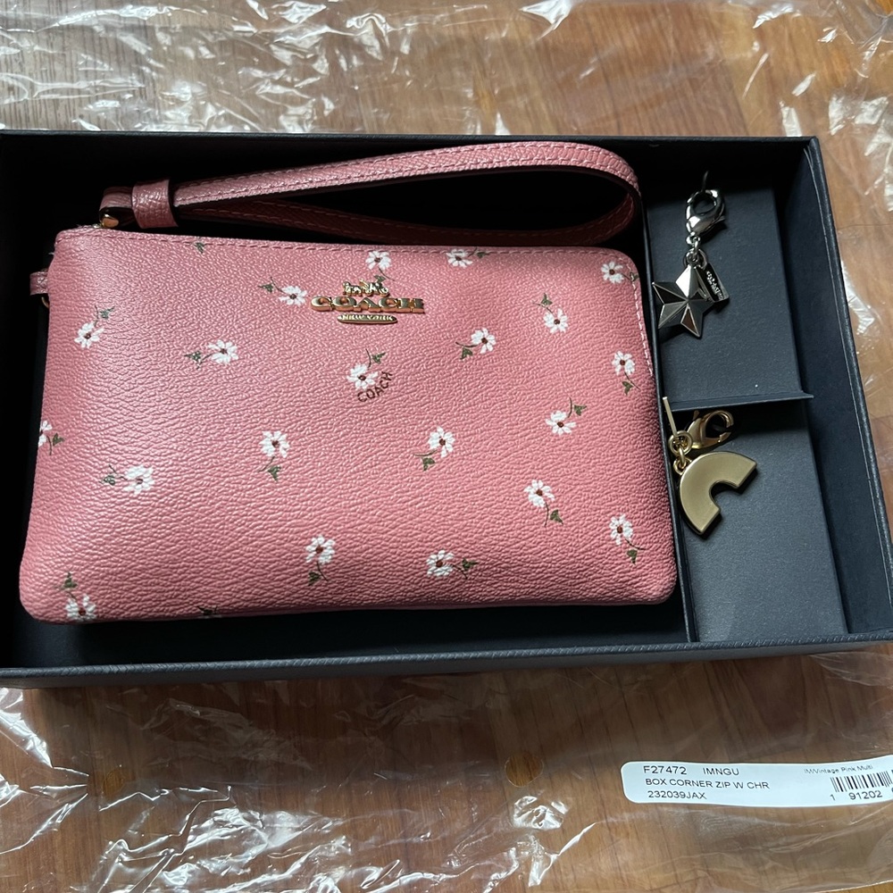 Coach outlet boxed corner zip wristlet with charms